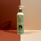 Shampoo bottle with green label on a two-tone background