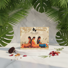 Product packaging with artistic depiction of women and nature elements on a white surface with green leaves.