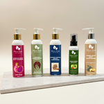 Set of five skincare products with pump dispensers on a wooden shelf against a beige background.