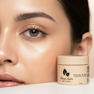Close-up of a woman's face with a jar of 'Cleaner Roots' eye cream on a neutral background
