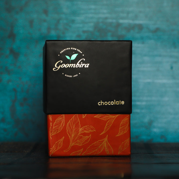 Goombira chocolate tea isolated on blue background