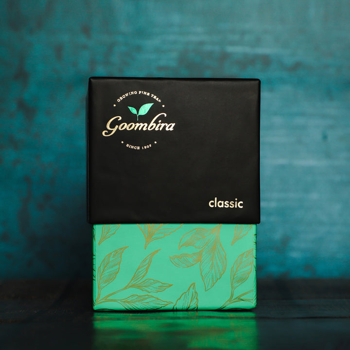 Goombira classic tea against a blue background